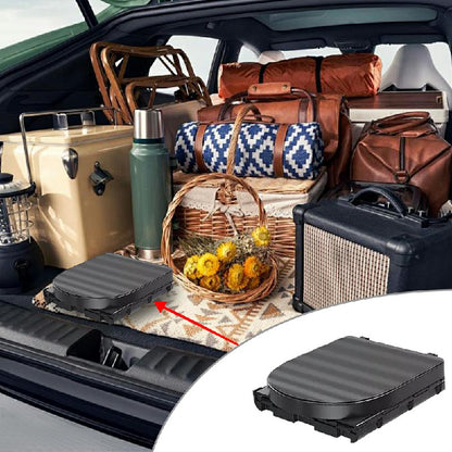 Folding portable toilet in car, black ribbed lid panel and upright waste bucket