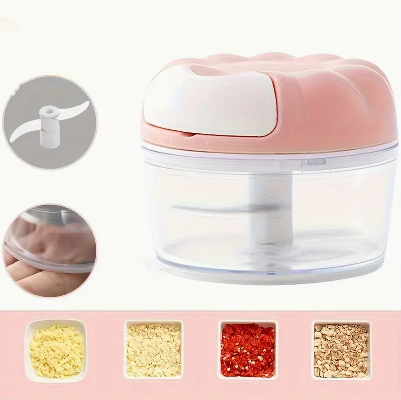 Manual food chopper with translucent bowl and light blue/pink lid, showing internal blade