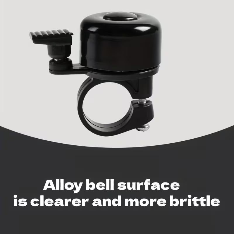 Black bicycle handlebar bell with clamp mount and ribbed side switch