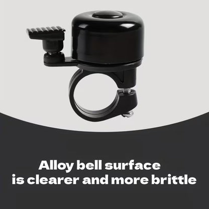 Black bicycle handlebar bell with clamp mount and ribbed side switch