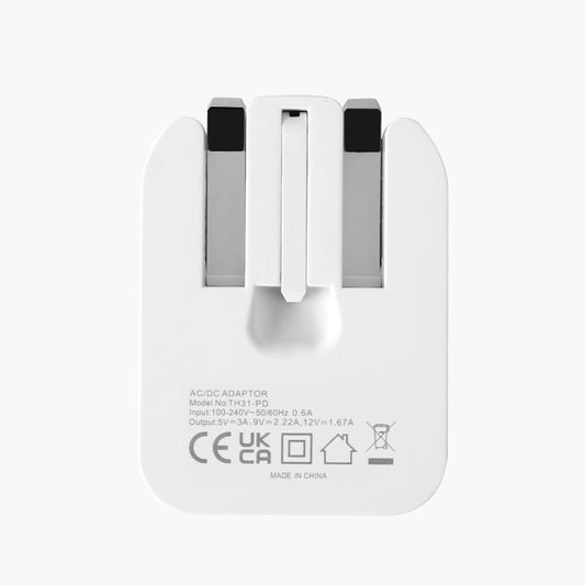White foldable mains AC adapter with plug prongs and port markings on back
