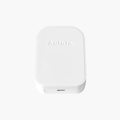 White foldable USB-C mains adapter front view with Autola logo and bottom port