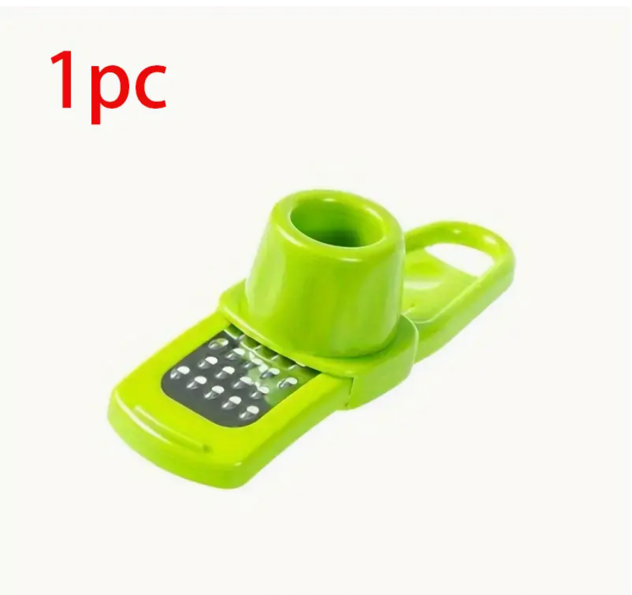 Green manual garlic press and grinder with grater opening, single-piece tool