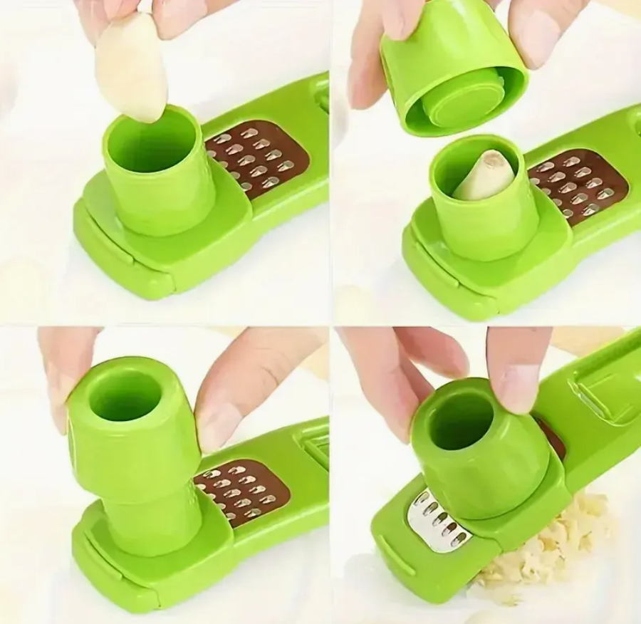 Green garlic press grinder in use, pressing garlic into the cup over the grater