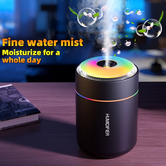 Portable mini humidifier with rainbow LED ring and mist outlet, compact dark cylinder