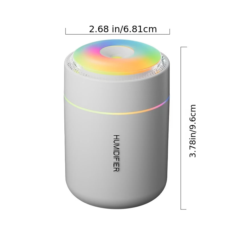 Mini humidifier with rainbow LED top, compact white cylinder and mist vent