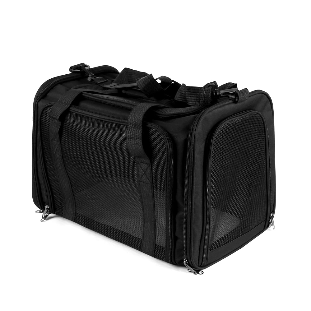 Foldable pet travel bag in black with multiple zip pockets and mesh side panels.