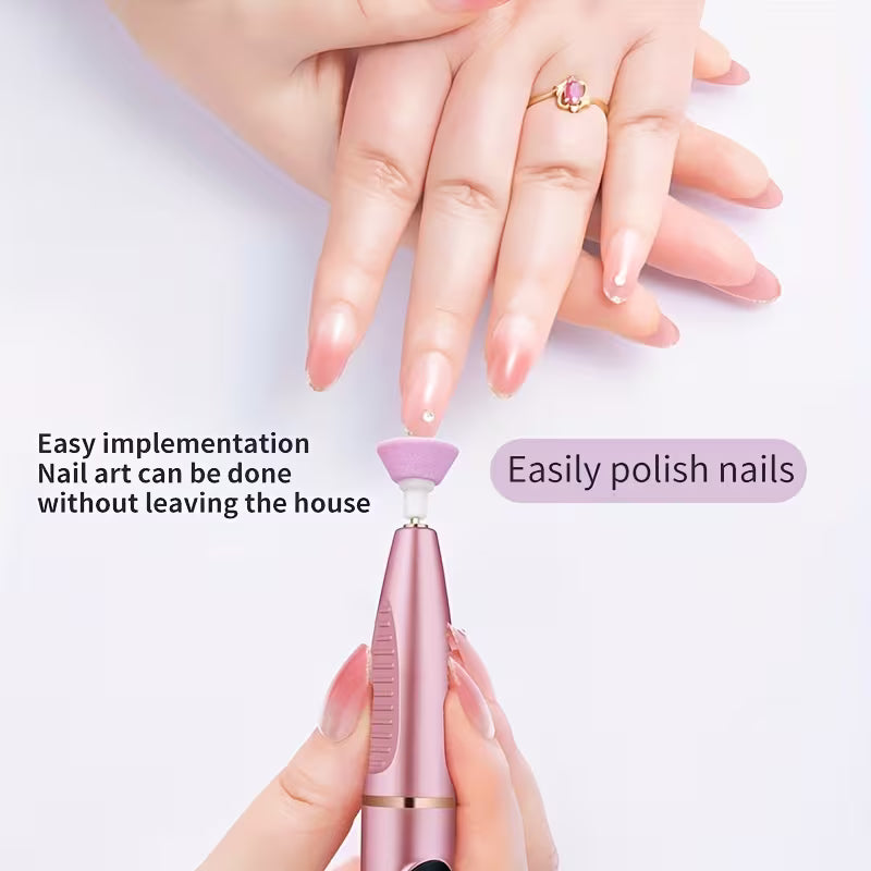 Cordless electric nail drill with rose-pink handle and attached sanding bit