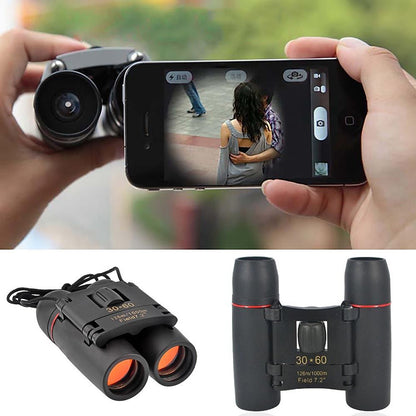 Black 30x60 binoculars with smartphone attached for viewing
