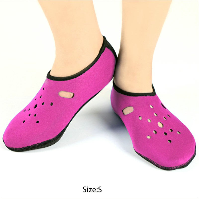 Rose red water shoes socks with black trim, perforated holes, slip-on design