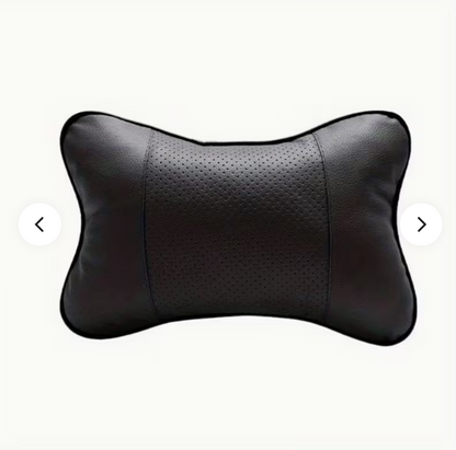 Black contoured neck pillow with perforated center and curved stitched side panels