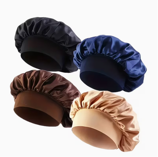 Satin-lined knit sleep beanies in black, navy, dark brown, and light tan with gathered crown