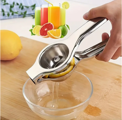 Stainless steel citrus hand juicer over glass bowl, pressing lemon halves