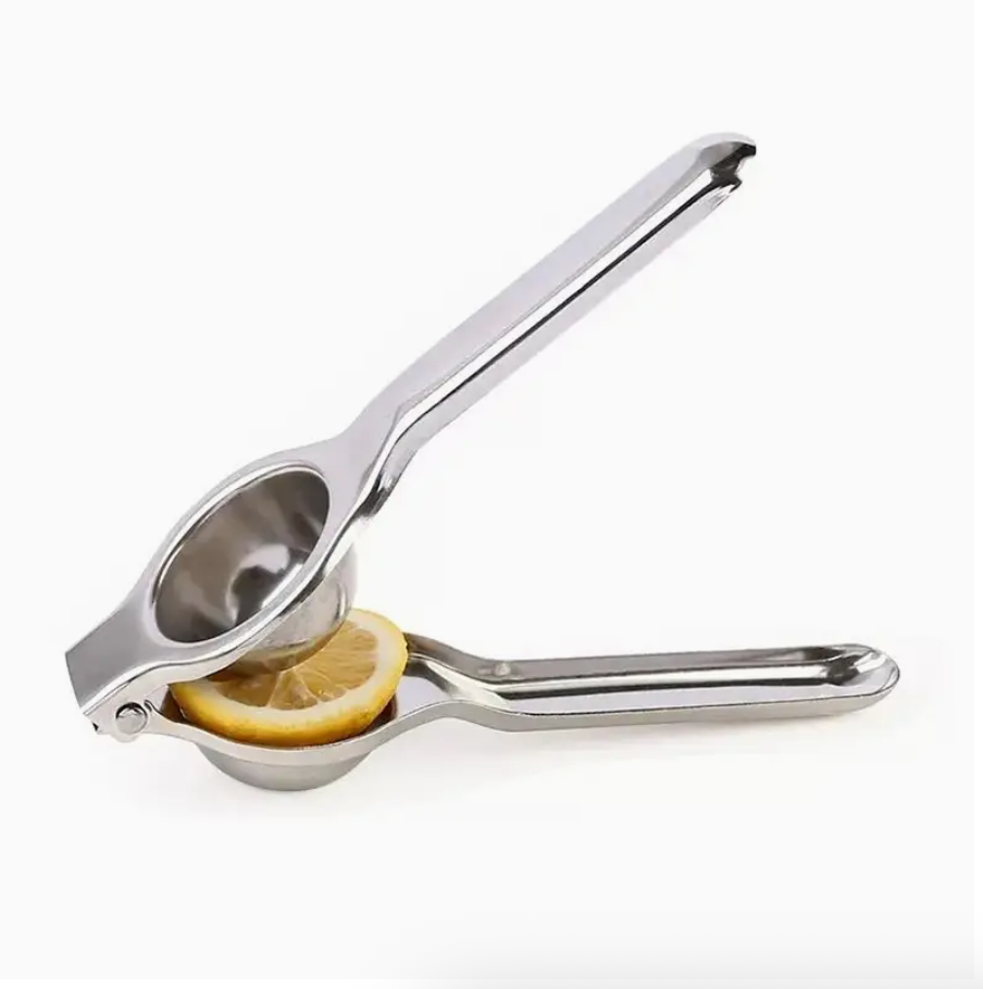 Stainless steel citrus juicer with cone reamer and lever handles, cut lemon inside