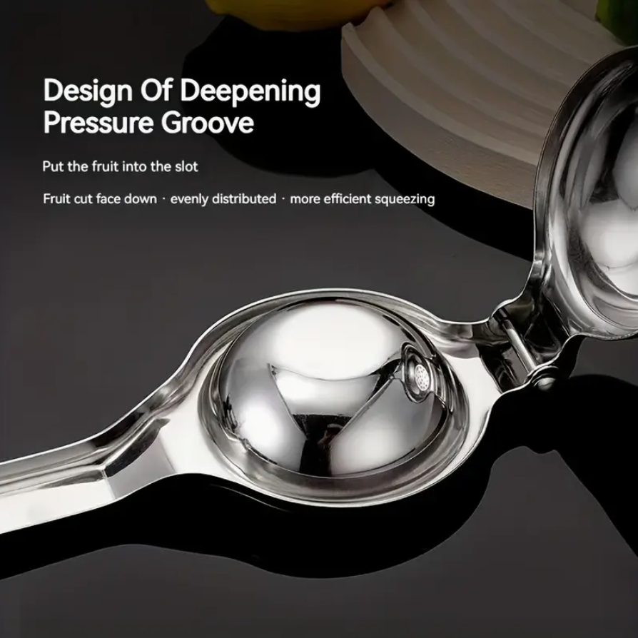 Stainless steel citrus juicer cone reamer and pressing lever, showing interior cup