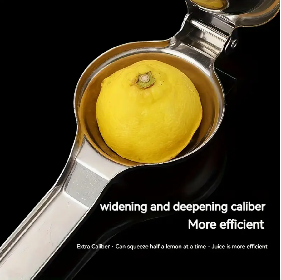 Stainless steel citrus juicer with cone reamer, holding a whole lemon for pressing
