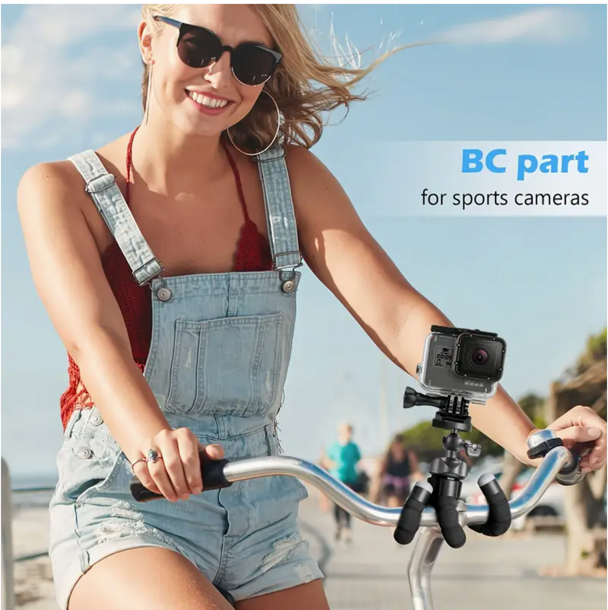 Black mini tripod with sports camera mount, angled for desktop or floor