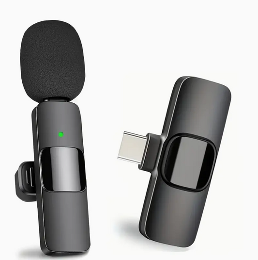 Black wireless clip-on microphone with foam windscreen and detachable holder