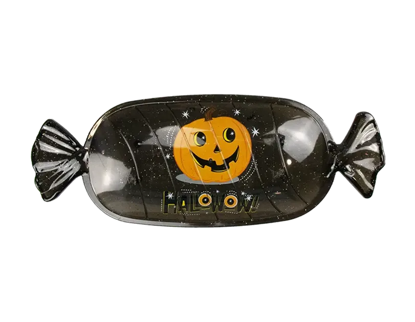 Black fish-shaped Halloween candy serving tray with jack-o-lantern face