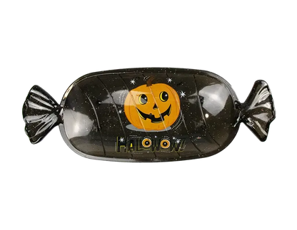 Black fish-shaped Halloween candy serving tray with jack-o-lantern face